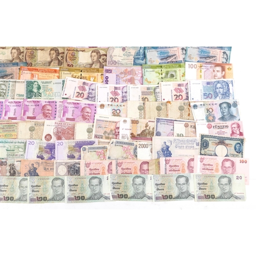 2216 - A quantity of vintage banknotes to include France, Mexico, Portugal, India and Sri Lanka.