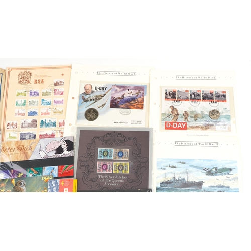 2236 - A small quantity of coin covers and British and world stamps to include World Word II commemorative ... 