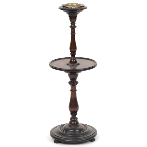 2051 - An early 20th century oak smoking stand, 71cm high, together with a late 20th century mahogany occas... 