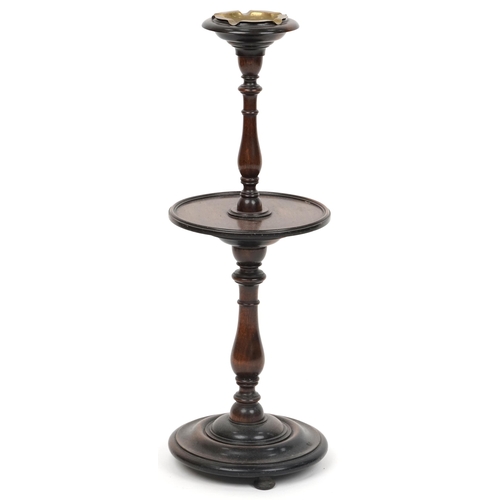 2051 - An early 20th century oak smoking stand, 71cm high, together with a late 20th century mahogany occas... 