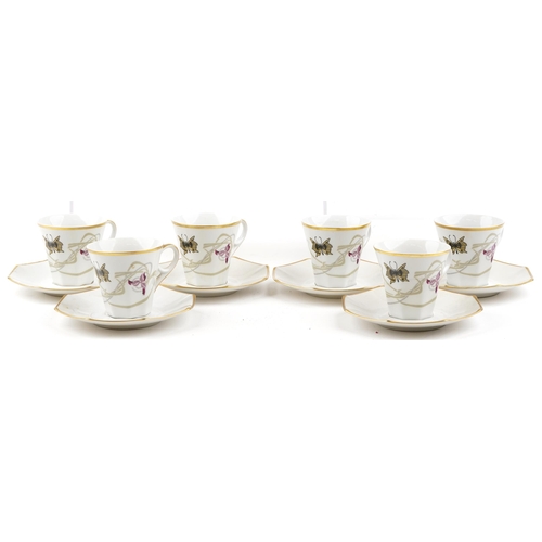 1231 - A Czechoslovakian Pirkenhammer six place tea set with gilded edges, the teapot 24cm high.