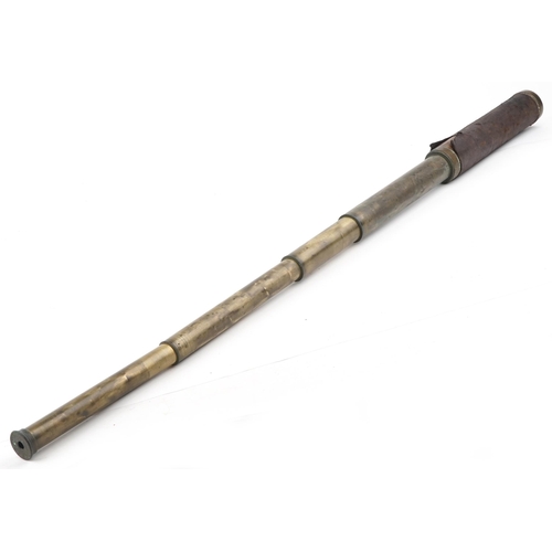  An early 20th century brass and leather bound five draw telescope by W & S. Jones, London, 150cm in ... 