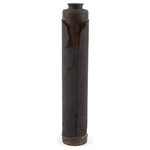 2471 - An early 20th century brass and leather bound four draw telescope by W & S. Jones, London, 150cm ext... 