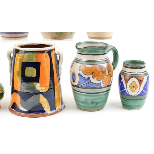 191A - A group of nine early 20th century pottery jugs and vases to include Beswick ware, Crown Ducal ware,... 