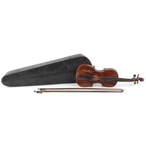 1041 - A 20th century violin, the length of back excluding button 36cm, together with two bows and a hard c... 