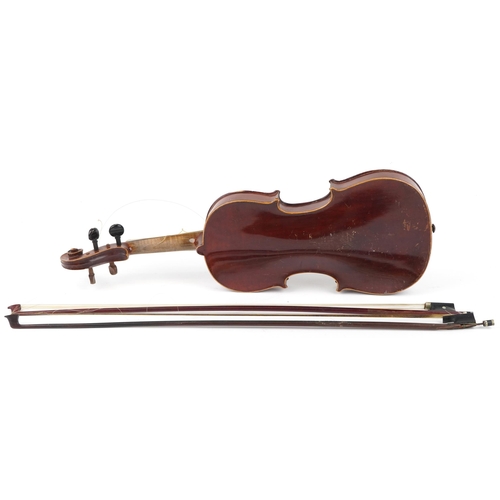 1041 - A 20th century violin, the length of back excluding button 36cm, together with two bows and a hard c... 