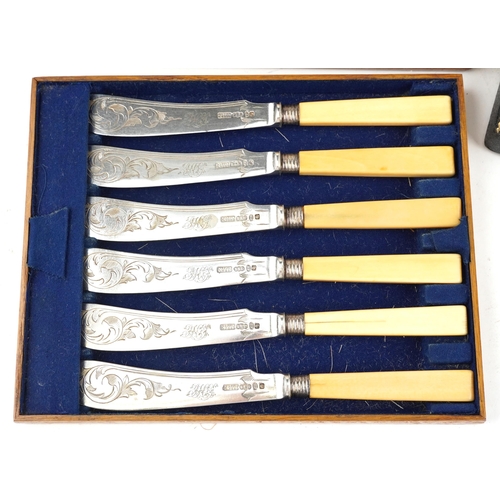 594 - An early 20th century Mappin & Webb plated set of fish knives and forks with bone handles within a c... 