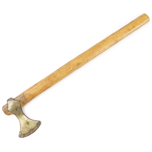 2537 - A decorative wooden handled axe with gilt lacquered head, 65cm in length.