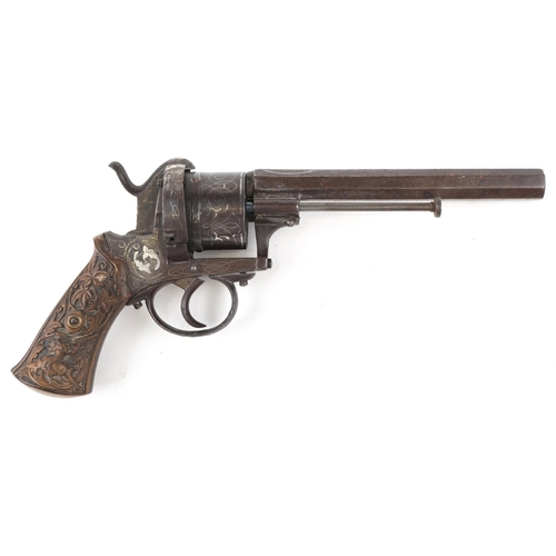 2550 - A 19th century silver inlaid pinfire officer's revolver with octagonal barrel, 27cm in length.