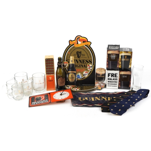 2327 - A collection of vintage and later Guinness memorabilia including antique bottle, glasses with boxes,... 