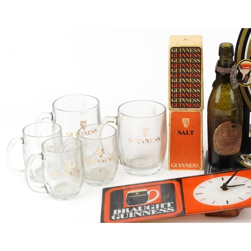 2327 - A collection of vintage and later Guinness memorabilia including antique bottle, glasses with boxes,... 