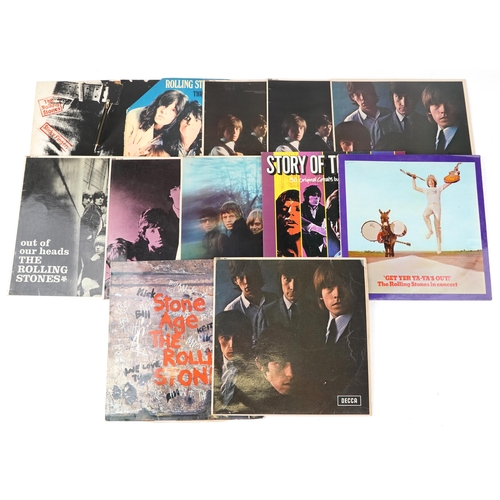 1052 - A group of The Rolling stones vinyl LP records including Sticky Fingers with zip sleeve, Through the... 