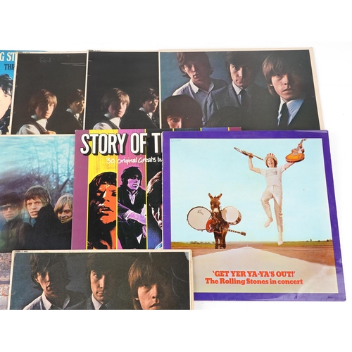 1052 - A group of The Rolling stones vinyl LP records including Sticky Fingers with zip sleeve, Through the... 