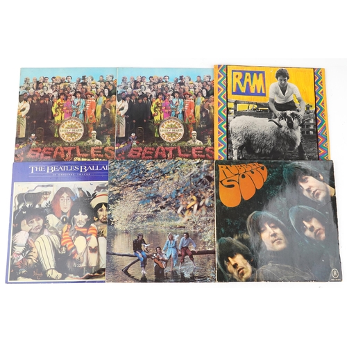 1051 - A group of The Beatles vinyl LP records including Sgt. Pepper's Lonely Hearts Club Band and Rubber S... 