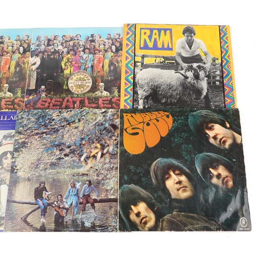 1051 - A group of The Beatles vinyl LP records including Sgt. Pepper's Lonely Hearts Club Band and Rubber S... 