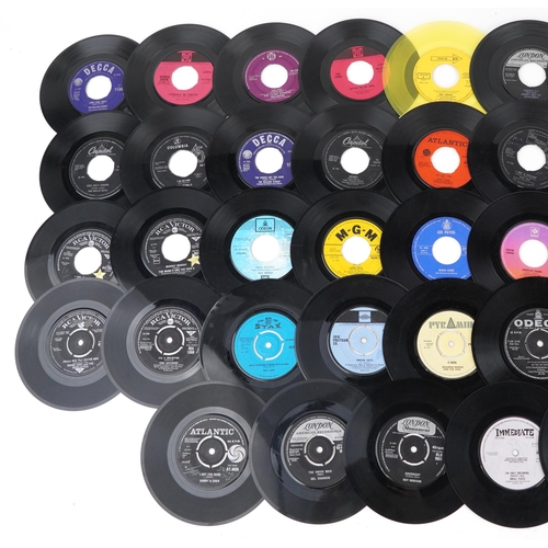 1050 - 45rpm records including The Rolling Stones, The Beatles, David Essex and The Hollies.