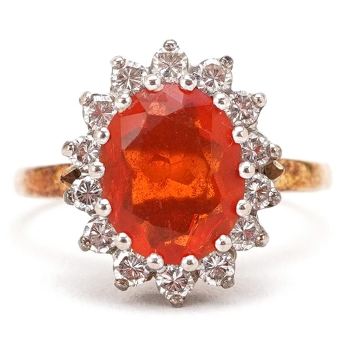 3077 - A continental gold orange stone and diamond cluster ring, the orange stone 9.80mm x 8.70mm, each dia... 