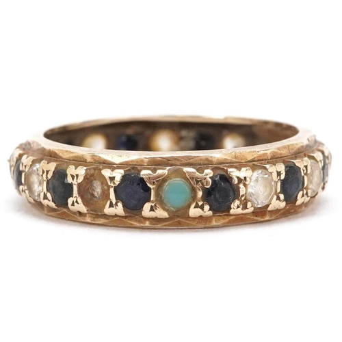 3345 - A 9ct gold sapphire and clear stone eternity ring, size P, 2.7g.