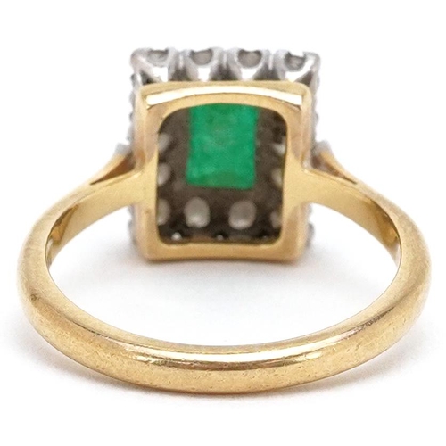  An 18ct gold rectangular cut emerald and diamond cluster ring, the ring head 10.80mm x 9.35mm, size ... 