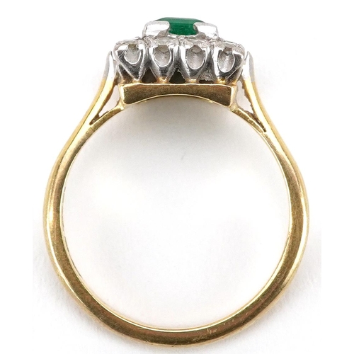  An 18ct gold rectangular cut emerald and diamond cluster ring, the ring head 10.80mm x 9.35mm, size ... 