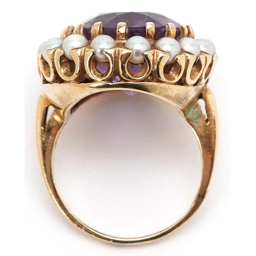 3014 - A large continental gold amethyst and cultured pearl ring, the ring head 23.10mm x 19.40mm, size J, ... 