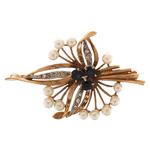 3058 - A 9ct gold diamond, sapphire and cultured pearl floral brooch, 4.8cm wide, 7.4g.