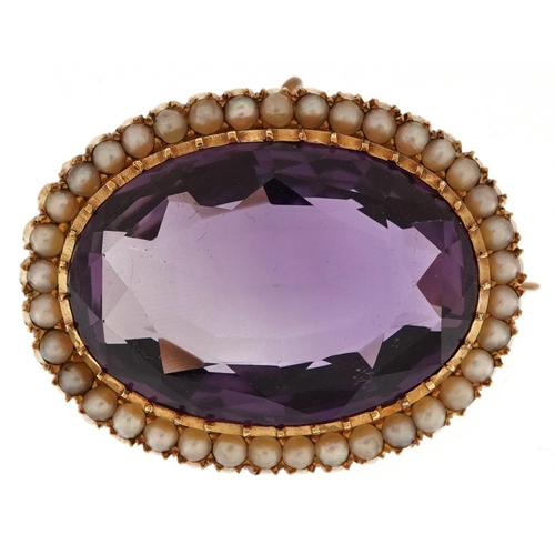 3035 - An antique 15ct gold amethyst and cultured pearl brooch, 3.4cm wide, 17.6g.