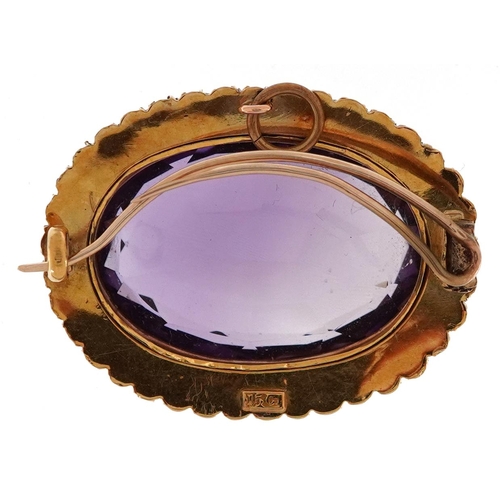 3035 - An antique 15ct gold amethyst and cultured pearl brooch, 3.4cm wide, 17.6g.