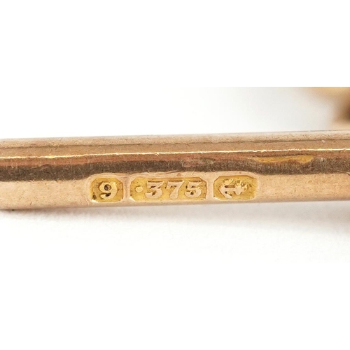 3231 - A 9ct gold T bar, 3.2cm wide, 3.6g.