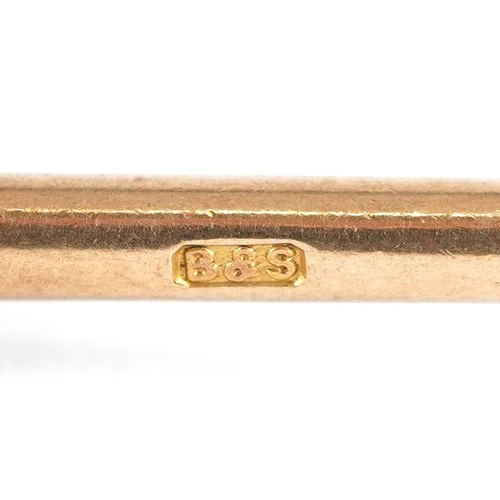 3231 - A 9ct gold T bar, 3.2cm wide, 3.6g.