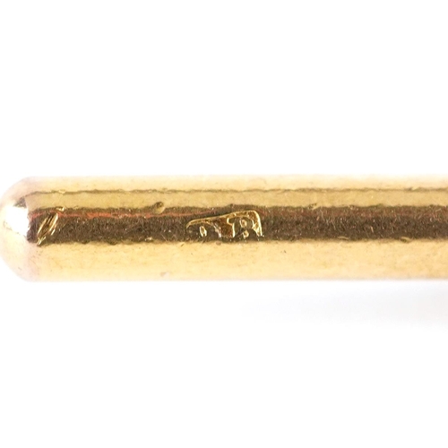 3084 - A 9ct gold T bar, 4.1cm in length, 4.5g.