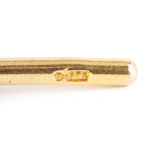 3084 - A 9ct gold T bar, 4.1cm in length, 4.5g.