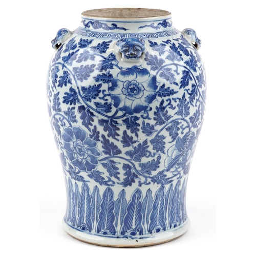  A Chinese blue and white porcelain jar, late 19th/early 20th century, decorated with flower heads an... 