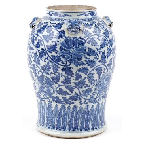  A Chinese blue and white porcelain jar, late 19th/early 20th century, decorated with flower heads an... 