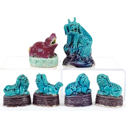 373 - A group of five Chinese turquoise glazed porcelain miniature Foo dogs, 20th century, together with a... 