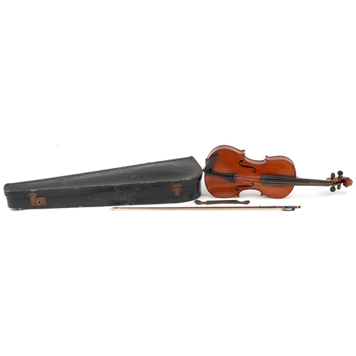 1040 - A 20th century violin, the length of back excluding button 35.5cm, with a bow, cased.