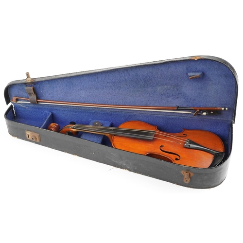 1040 - A 20th century violin, the length of back excluding button 35.5cm, with a bow, cased.