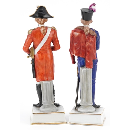 245 - A pair of 20th century French porcelain figures of army officers with hand painted decoration, 24cm ... 