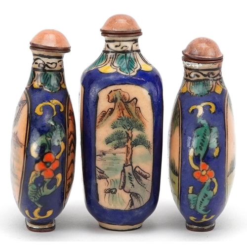 397 - Three Chinese enamelled scent bottles, 20th century, each with hand painted landscape scenes, 7cm hi... 