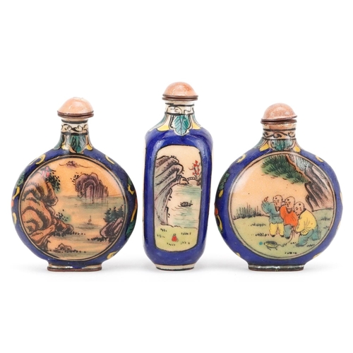 397 - Three Chinese enamelled scent bottles, 20th century, each with hand painted landscape scenes, 7cm hi... 