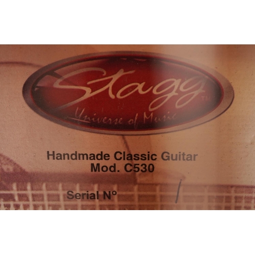 1039 - A Stagg classical acoustic six string guitar, model C530, 94cm in length.