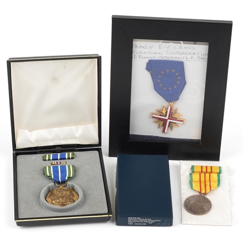 2408 - Three military interest medals including US Army Achievement medal set in box and French EU Cross Eu... 