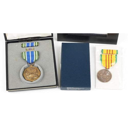 2408 - Three military interest medals including US Army Achievement medal set in box and French EU Cross Eu... 