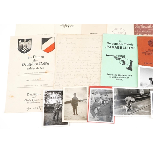 2452 - German militaria including black and white photographs, postcards, badges and Women's Order of the P... 