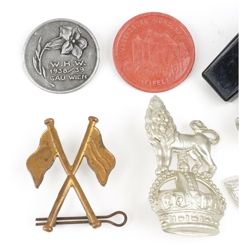 2467 - Militaria including British military interest badges, German Donation badges and ACME Scout whistles... 