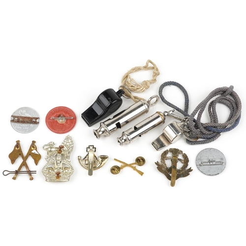 2467 - Militaria including British military interest badges, German Donation badges and ACME Scout whistles... 