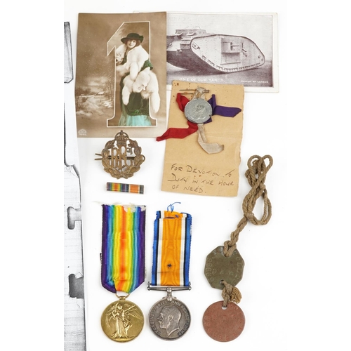 2423 - British Royal Flying Corps militaria relating to 69988.2.A.M.F.COLLINS.R.A.F. including medal pair a... 