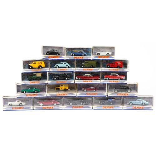 Twenty Dinky diecast vehicles with boxes including a 1950 Ford E83W 10cwt van, a 1965 Triumph, M.G.B.GT 1965, 1949 Land Rover and a 1967 Ford Mustang Fastback.