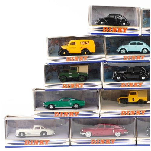  Twenty Dinky diecast vehicles with boxes including a 1950 Ford E83W 10cwt van, a 1965 Triumph, M.G.B... 