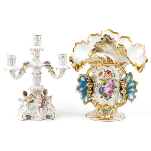 119 - A 20th century Sitzendorf porcelain candelabra with hand painted and gilded decoration, 31cm high, b... 